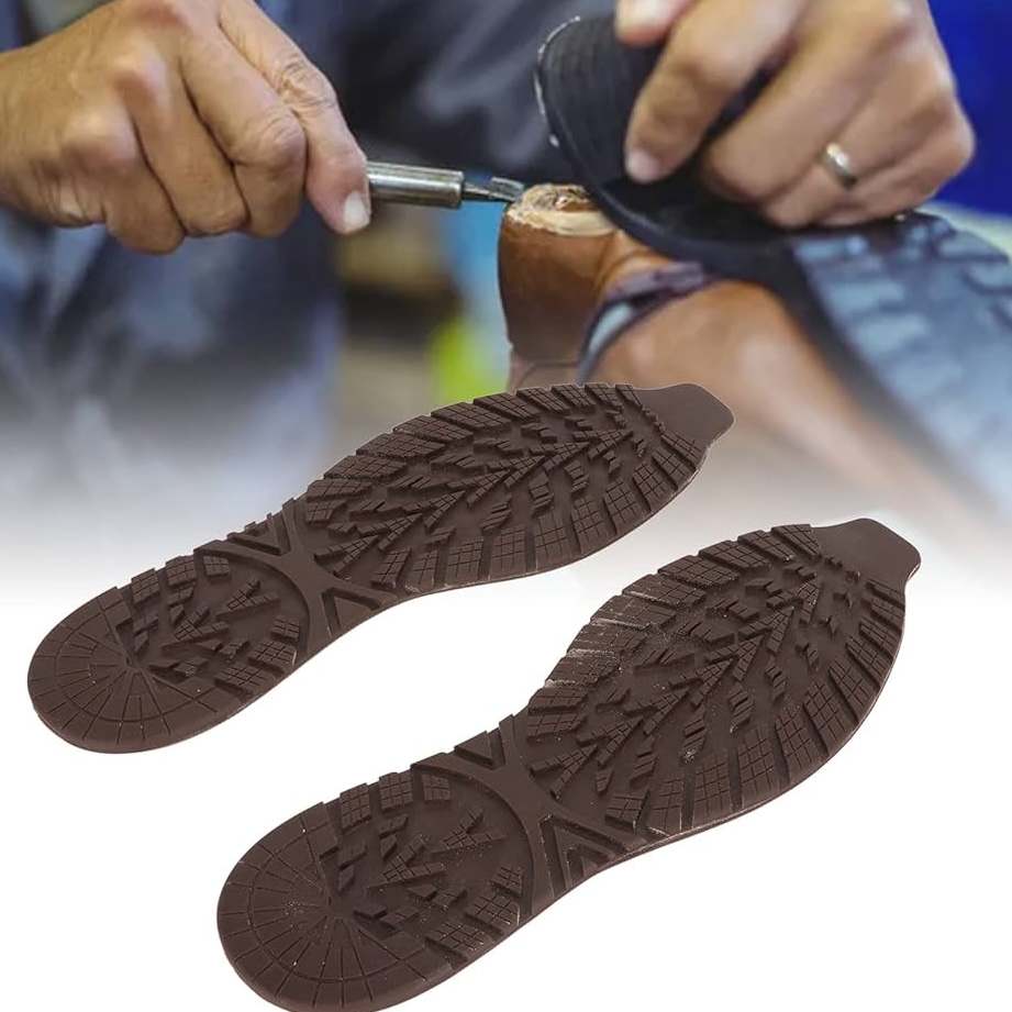Replacement tread soles beside shoe-repair work